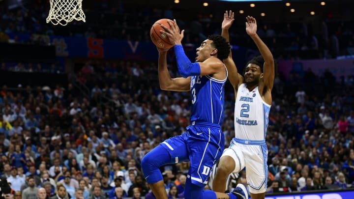 CHARLOTTE, NC – MARCH 15: Duke Blue Devils guard Tre Jones (3) goes in for a fast break layup during the ACC basketball tournament between the Duke Blue Devils and the North Carolina Tar Heels on March 15, 2019, at the Spectrum Center in Charlotte, NC. (Photo by William Howard/Icon Sportswire via Getty Images)