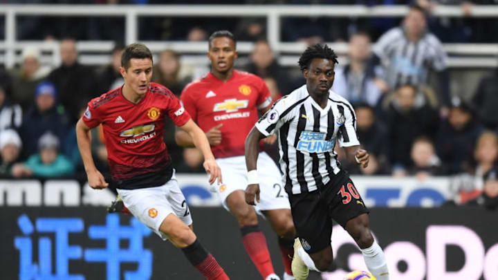 NEWCASTLE UPON TYNE, ENGLAND - JANUARY 02: Christian Atsu of Newcastle United is challenged by Ander Herrera of Manchester United during the Premier League match between Newcastle United and Manchester United at St. James Park on January 2, 2019 in Newcastle upon Tyne, United Kingdom. (Photo by Michael Regan/Getty Images)