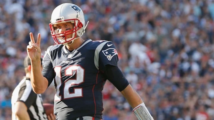 FOXBORO, MA - SEPTEMBER 24: Tom Brady #12 of the New England Patriots reacts after throwing the game winning touchdown pass during the fourth quarter of a game against the Houston Texans at Gillette Stadium on September 24, 2017 in Foxboro, Massachusetts. (Photo by Jim Rogash/Getty Images)