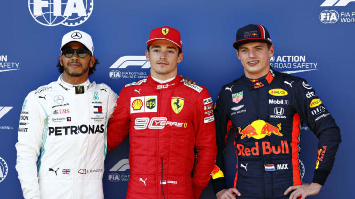 SPIELBERG, AUSTRIA - JUNE 29: Top three qualifiers Charles Leclerc of Monaco and Ferrari, Lewis Hamilton of Great Britain and Mercedes GP and Max Verstappen of Netherlands and Red Bull Racing celebrate in parc ferme during qualifying for the F1 Grand Prix of Austria at Red Bull Ring on June 29, 2019 in Spielberg, Austria. (Photo by Will Taylor-Medhurst/Getty Images)