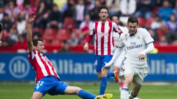 GIJON, SPAIN - APRIL 15: Mateo Kovacic of Real Madrid duels for the ball with Mikel Vesga of Real Sporting de Gijon during the La Liga match between Real Sporting de Gijon and Real Madrid at Estadio El Molinon on April 15, 2017 in Gijon, Spain. (Photo by Juan Manuel Serrano Arce/Getty Images)