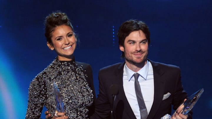 LOS ANGELES, CA - JANUARY 08: Actors Nina Dobrev (L) and Ian Somerhalder, winners of the Favorite On Screen Chemistry award for "The Vampire Diaries," speak onstage at The 40th Annual People's Choice Awards at Nokia Theatre L.A. Live on January 8, 2014 in Los Angeles, California. (Photo by Kevin Winter/Getty Images)