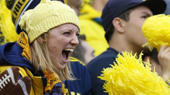 Oct 17, 2015; Ann Arbor, MI, USA; Michigan Wolverines fan cheers durning the game against the Michigan State Spartans in the first half at Michigan Stadium. Mandatory Credit: Rick Osentoski-USA TODAY Sports