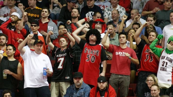 LAS VEGAS - MARCH 13: San Diego State Aztecs fans cheer during a game against the Brigham Young University Cougars during a semifinal game of the Conoco Mountain West Conference Basketball Championships at the Thomas & Mack Center March 13, 2009 in Las Vegas, Nevada. The Aztecs won 64-62. (Photo by Ethan Miller/Getty Images)