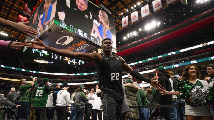 Dec 21, 2021; Detroit, Michigan, USA; Michigan State Spartans center Mady Sissoko (22) celebrates with fans after the game against the Oakland Golden Grizzlies at Little Caesars Arena. Mandatory Credit: Raj Mehta-USA TODAY Sports