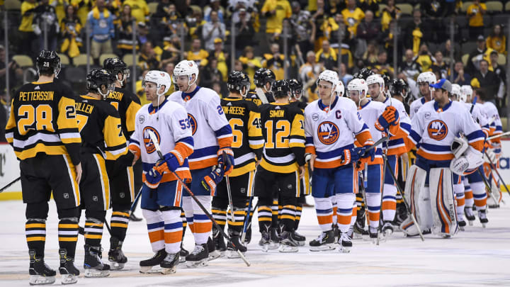 PITTSBURGH, PA – APRIL 16: The New York Islanders and Pittsburgh Penguins shake hands at the end Game 4 in the First Round of the 2019 NHL Stanley Cup Playoffs between the New York Islanders and the Pittsburgh Penguins on April 16, 2019, at PPG Paints Arena in Pittsburgh, PA. The New York Islanders won the series 4-0. (Photo by Jeanine Leech/Icon Sportswire via Getty Images)