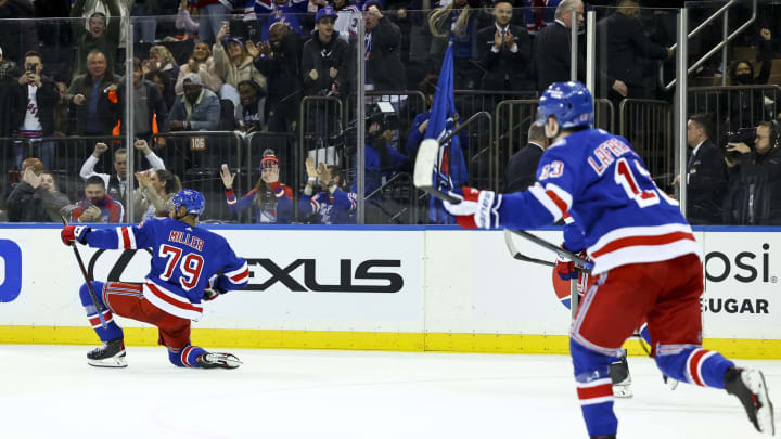 Mar 27, 2022; New York, New York, USA; New York Rangers defenseman K’Andre Miller (79) celebrates his game winning goal against the Buffalo Sabres in overtime at Madison Square Garden. Mandatory Credit: Jessica Alcheh-USA TODAY Sports