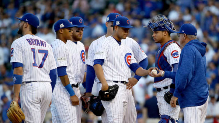 CHICAGO, IL - OCTOBER 09: Manager Joe Maddon of the Chicago Cubs relieves Jose Quintana(Photo by Jonathan Daniel/Getty Images)