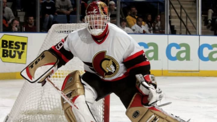 UNIONDALE, NY – NOVEMBER 25: Goaltender Dominik Hasek #39 of the Ottawa Senators looks to play the puck against the New York Islanders during their game on November 25, 2005 at Nassau Coliseum in Uniondale, New York. The Sens defeated the Isles 6-2. (Photo by Jim McIsaac/Getty Images)