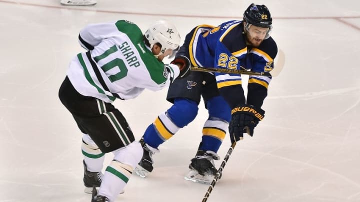 May 3, 2016; St. Louis, MO, USA; St. Louis Blues defenseman Kevin Shattenkirk (22) breaks up a pass from Dallas Stars left wing Patrick Sharp (10) during the third period in game three of the second round of the 2016 Stanley Cup Playoffs at Scottrade Center. The St. Louis Blues defeat the Dallas Stars 6-1. Mandatory Credit: Jasen Vinlove-USA TODAY Sports