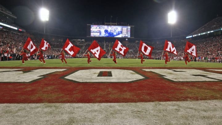 NORMAN, OK - OCTOBER 28: Members of the Oklahoma Sooners spirit squad celebrate a touchdown against the Texas Tech Red Raiders at Gaylord Family Oklahoma Memorial Stadium on October 28, 2017 in Norman, Oklahoma. Oklahoma defeated Texas Tech 49-27. (Photo by Brett Deering/Getty Images) *** Local Caption ***