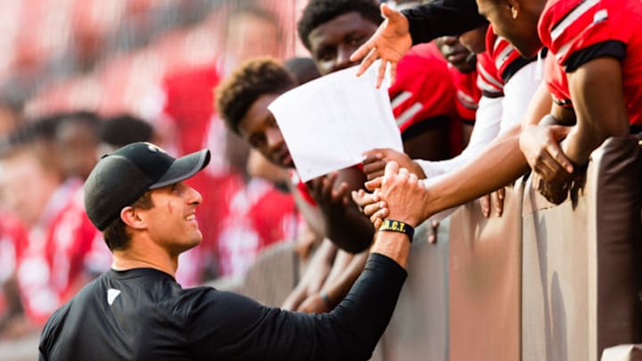 CLEVELAND, OH - AUGUST 10: Quarterback Drew Brees #9 of the New Orleans Saints talks with local high school football players prior to the preseason game against the Cleveland Browns at FirstEnergy Stadium on August 10, 2017 in Cleveland, Ohio. (Photo by Jason Miller/Getty Images)