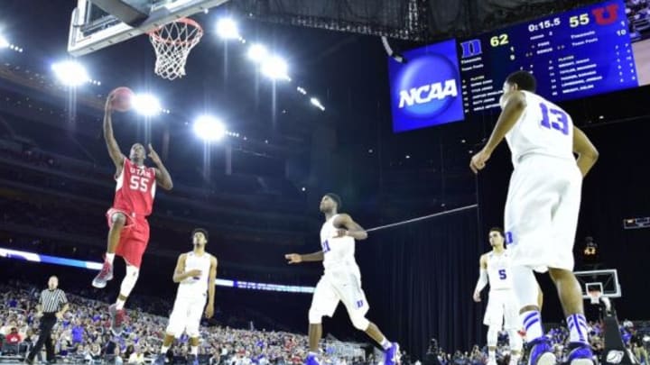 Mar 27, 2015; Houston, TX, USA; Utah Utes guard Delon Wright (55) shoots against the Duke Blue Devils during the second half in the semifinals of the south regional of the 2015 NCAA Tournament at NRG Stadium. Mandatory Credit: Bob Donnan-USA TODAY Sports