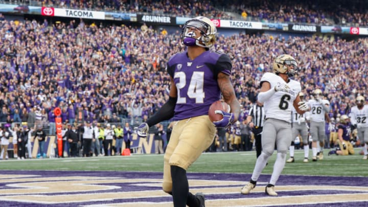 SEATTLE, WA - OCTOBER 20: Tailback Kamari Pleasant #24 of the Washington Huskies rushes for a touchdown against the Colorado Buffaloes at Husky Stadium on October 20, 2018 in Seattle, Washington. (Photo by Otto Greule Jr/Getty Images)