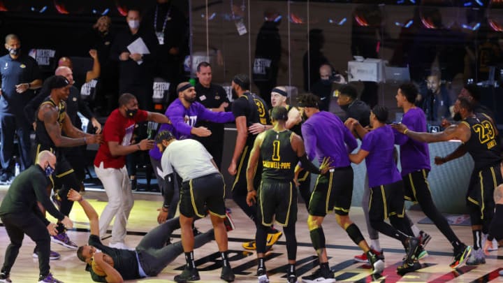 LAKE BUENA VISTA, FLORIDA - SEPTEMBER 20: Anthony Davis #3 of the Los Angeles Lakers celebrates with his temamates after shooting a three point basket to win the game over Denver Nuggets in Game Two of the Western Conference Finals during the 2020 NBA Playoffs at AdventHealth Arena at the ESPN Wide World Of Sports Complex on September 20, 2020 in Lake Buena Vista, Florida. NOTE TO USER: User expressly acknowledges and agrees that, by downloading and or using this photograph, User is consenting to the terms and conditions of the Getty Images License Agreement. (Photo by Kevin C. Cox/Getty Images)