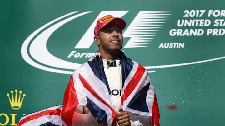 AUSTIN, TX - OCTOBER 22: Race winner Lewis Hamilton of Great Britain and Mercedes GP celebrates on the podium during the United States Formula One Grand Prix at Circuit of The Americas on October 22, 2017 in Austin, Texas. (Photo by Clive Mason/Getty Images)