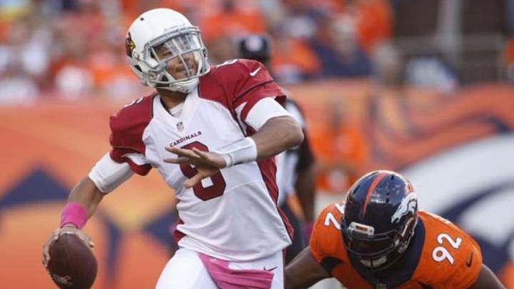 Oct 5, 2014; Denver, CO, USA; Arizona Cardinals quarterback Logan Thomas (6) looks to throw the ball as he is pressured from Denver Broncos defensive tackle Sylvester Williams (92) during the second half at Sports Authority Field at Mile High. The Broncos won 41-20. Mandatory Credit: Chris Humphreys-USA TODAY Sports Oct 5, 2014; Denver, CO, USA; Arizona Cardinals quarterback Logan Thomas (6) looks to throw the ball as he is pressured from Denver Broncos defensive tackle Sylvester Williams (92) during the second half at Sports Authority Field at Mile High. The Broncos won 41-20. Mandatory Credit: Chris Humphreys-USA TODAY Sports