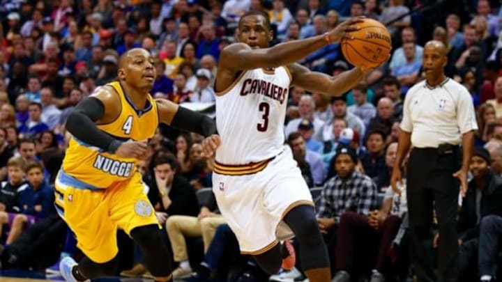 Nov 7, 2014; Denver, CO, USA; Cleveland Cavaliers guard Dion Waiters (3) drives to the net against Denver Nuggets guard Randy Foye (4) in the third quarter at the Pepsi Center. The Cavaliers won 110-101. Mandatory Credit: Isaiah J. Downing-USA TODAY Sports