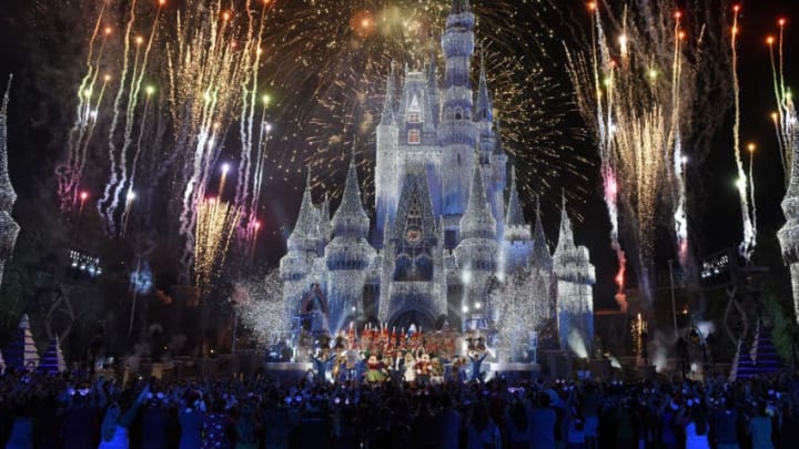 LAKE BUENA VISTA, FL - NOVEMBER 05: In this handout photo provided by Disney Parks, a view of fireworks, holiday lights and fanfare at Cinderella's Castle during a taping of Disney Parks Presents a Disney Channel Holiday Celebration at Walt Disney World Resort on November 05, 2017 in Lake Buena Vista, Florida. The holiday special is available on the DisneyNOW app beginning November 24 and officially premieres on Disney Channel December 1, 8-9:30 p.m. ET (Photo by Todd Anderson/Disney Parks via Getty Images)