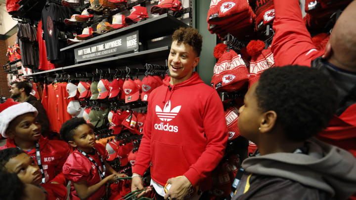 Kansas City Chiefs quarterback Patrick Mahomes II takes part in a check donation and shopping spree event to benefit players with KC United, a local youth football league at the DICK’S Sporting Goods, Tuesday, Nov. 27, 2018 in Leawood, Kan. (Colin Braley/AP Images for DICK’S Sporting Goods)