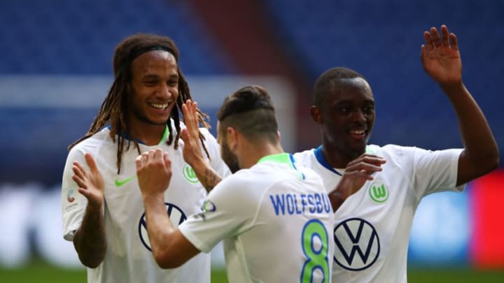 Wolfsburg players celebrating against FC Schalke. (Photo by Dean Mouhtaropoulos/Getty Images)