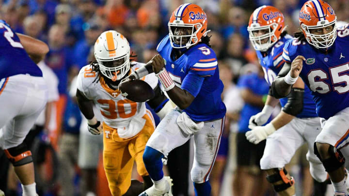 Florida quarterback Emory Jones (5) runs the ball during a game at Ben Hill Griffin Stadium in Gainesville, Fla. on Saturday, Sept. 25, 2021.Kns Tennessee Florida Football