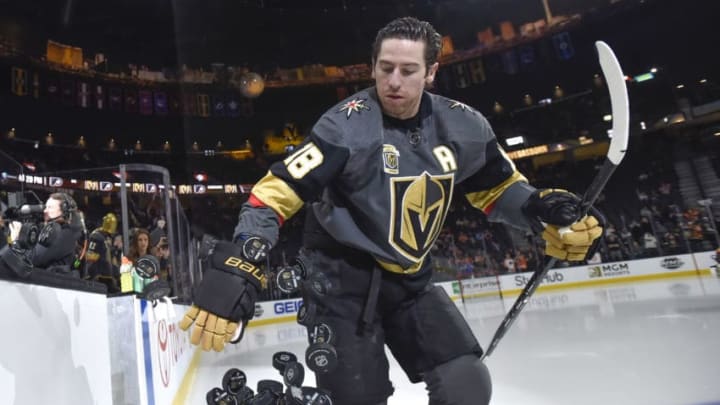 LAS VEGAS, NV - FEBRUARY 11: James Neal #18 of the Vegas Golden Knights tosses pucks onto the ice during warmups prior to the game against the Philadelphia Flyers at T-Mobile Arena on February 11, 2018 in Las Vegas, Nevada. (Photo by David Becker/NHLI via Getty Images)