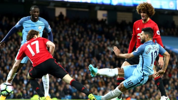 MANCHESTER, ENGLAND - APRIL 27: Sergio Aguero of Manchester City takes a shot on goal during the Premier League match between Manchester City and Manchester United at Etihad Stadium on April 27, 2017 in Manchester, England. (Photo by Clive Brunskill/Getty Images)