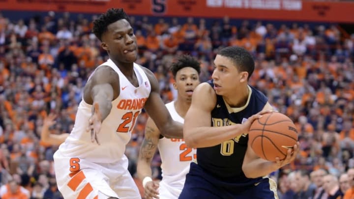 Feb 20, 2016; Syracuse, NY, USA; Pittsburgh Panthers guard James Robinson (0) handles a full court pressure by Syracuse Orange forward Tyler Roberson (21) during the second half of a game at the Carrier Dome. Pittsburgh won 66-52. Mandatory Credit: Mark Konezny-USA TODAY Sports