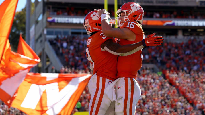 CLEMSON, SC – NOVEMBER 03: Teammates Trevor Lawrence #16 and Amari Rodgers #3 of the Clemson Tigers celebrate after a touchdown against the Louisville Cardinals during their game at Clemson Memorial Stadium on November 3, 2018 in Clemson, South Carolina. (Photo by Streeter Lecka/Getty Images)