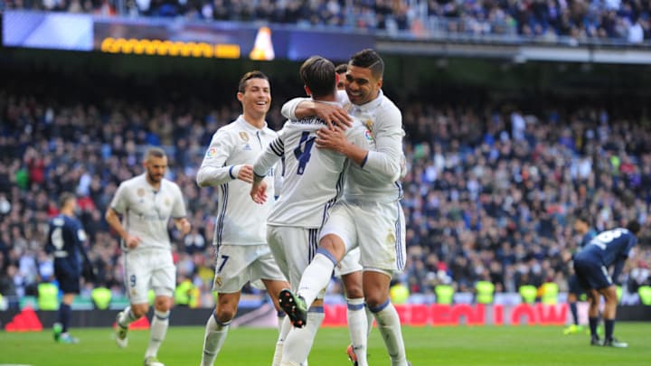 MADRID, SPAIN - JANUARY 21: Sergio Ramos of Real Madrid celebrates with Henrique Casemiro after scoring his team's 1st goal during the La Liga match between Real Madrid CF and Malaga CF at the Bernabeu on January 21, 2017 in Madrid, Spain. (Photo by Denis Doyle/Getty Images)