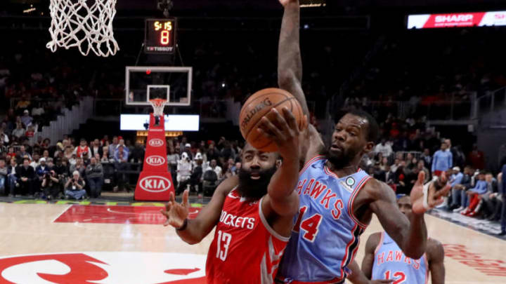 Houston Rockets guard James Harden (13) shoots against Atlanta Hawks center Dewayne Dedmon(Jason Getz-USA TODAY Sports)