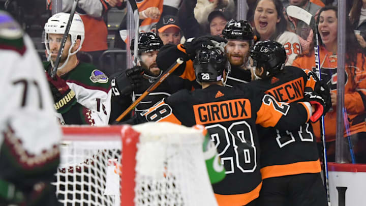 Nov 2, 2021; Philadelphia, Pennsylvania, USA; Philadelphia Flyers center Sean Couturier (14) celebrates his goal with teammates against the Arizona Coyotes during the third period at Wells Fargo Center. Mandatory Credit: Eric Hartline-USA TODAY Sports