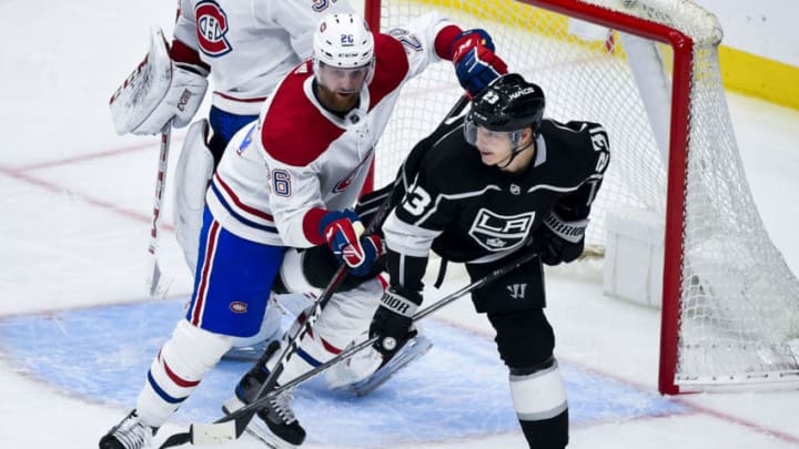 LOS ANGELES, CA - MARCH 5: Jeff Petry #26 of the Montreal Canadiens and Dustin Brown #23 of the Los Angeles Kings battle for position during the second period of the game at STAPLES Center on March 5, 2019 in Los Angeles, California. (Photo by Andrew D. Bernstein/NHLI via Getty Images) *** Local Caption ***