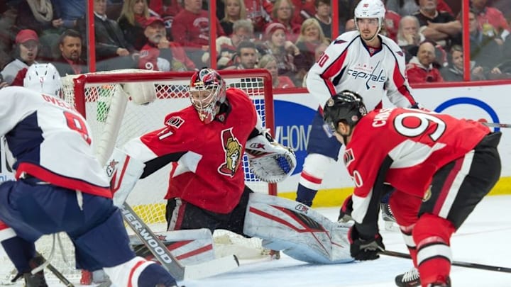 Mar 22, 2016; Ottawa, Ontario, CAN; Washington Capitals left wing Alex Ovechkin (8) scores against Ottawa Senators goalie Craig Anderson (41 in the first period at the Canadian Tire Centre. Mandatory Credit: Marc DesRosiers-USA TODAY Sports