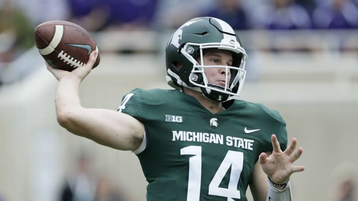 EAST LANSING, MI – OCTOBER 6: Quarterback Brian Lewerke #14 of the Michigan State Spartans passes against the Northwestern Wildcats during the first half at Spartan Stadium on October 6, 2018 in East Lansing, Michigan. (Photo by Duane Burleson/Getty Images)