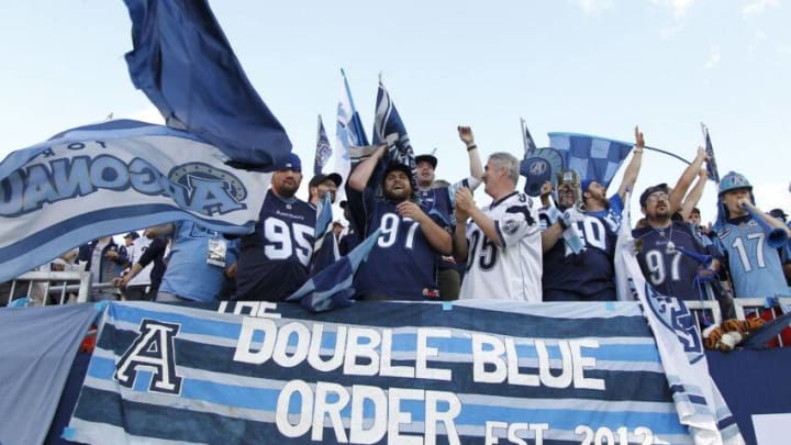 Toronto Argonauts fans celebrate during a CFL game at BMO Field. (Photo by John E. Sokolowski/Getty Images)