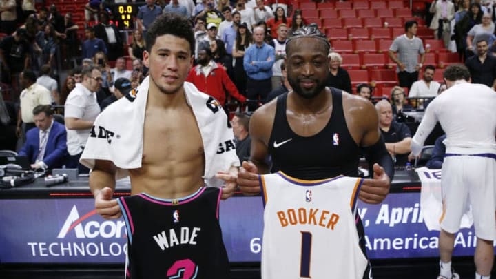 Devin Booker Dwyane Wade Phoenix Suns Miami Heat (Photo by Michael Reaves/Getty Images)