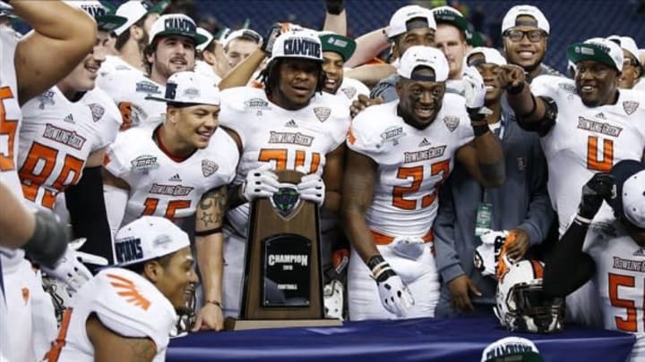 Dec 6, 2013; Detroit, MI, USA; Bowling Green Falcons players celebrate after the game against the Northern Illinois Huskies at Ford Field. Bowling Green won 47-27 to win the Mac Championship. Mandatory Credit: Rick Osentoski-USA TODAY Sports