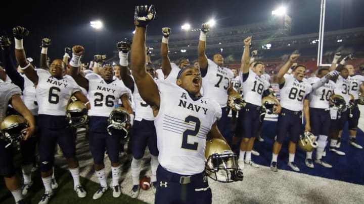 Nov 26, 2016; Dallas, TX, USA; Navy running back Toneo Gulley (2) leads the cheer following the Midshipmen