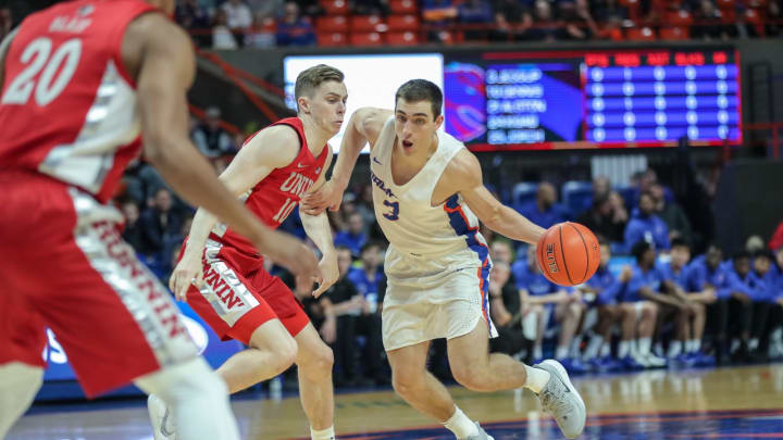 BOISE, ID – JANUARY 08: Guard Justinian Jessup #3 of the Boise State Broncos drives into the key around the defense of guard Jonah Antonio #10 of the UNLV Rebels during first half action at ExtraMile Arena on January 08, 2020 in Boise, Idaho. (Photo by Loren Orr/Getty Images)