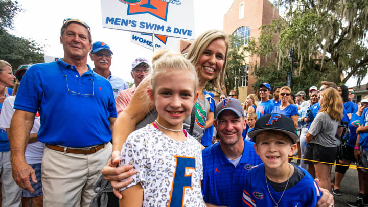 Ocala’s Tommy Bond poses with his family before the Florida Gators arrived for Gator Walk as they were greeted by fans before playing the Tennessee Volunteers Saturday September 25, 2021 at Ben Hill Griffin Stadium in Gainesville, FL. [Doug Engle/GainesvilleSun]2021Flgai 092521 Gatorsvsvolsgatorwalk