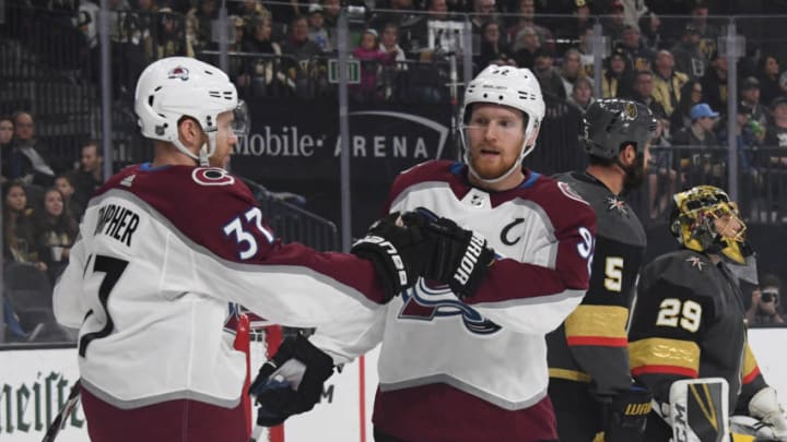 LAS VEGAS, NEVADA - DECEMBER 27: J.T. Compher #37 and Gabriel Landeskog #92 of the Colorado Avalanche celebrate after Compher scored a first-period power-play goal against the Vegas Golden Knights during their game at T-Mobile Arena on December 27, 2018 in Las Vegas, Nevada. (Photo by Ethan Miller/Getty Images)