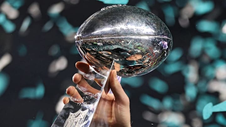 MINNEAPOLIS, MN - FEBRUARY 04: Quarterback Nick Foles #9 of the Philadelphia Eagles raises the Vince Lombardi Trophy after defeating the New England Patriots, 41-33, in Super Bowl LII at U.S. Bank Stadium on February 4, 2018 in Minneapolis, Minnesota. (Photo by Patrick Smith/Getty Images)