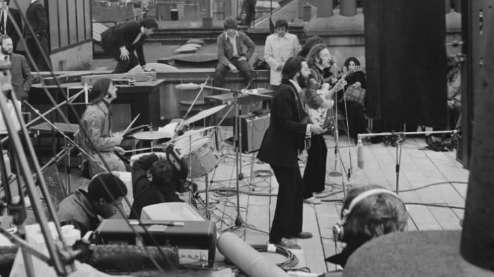 The Beatles performing their last live public concert on the rooftop of London's Apple building on January 30, 1969.