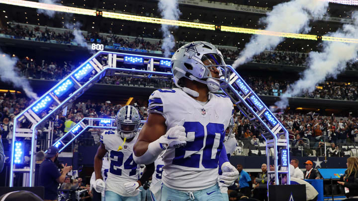 ARLINGTON, TEXAS – DECEMBER 24: Tony Pollard #20 of the Dallas Cowboys runs onto the field before the game against the Philadelphia Eagles at AT&T Stadium on December 24, 2022, in Arlington, Texas. (Photo by Richard Rodriguez/Getty Images)