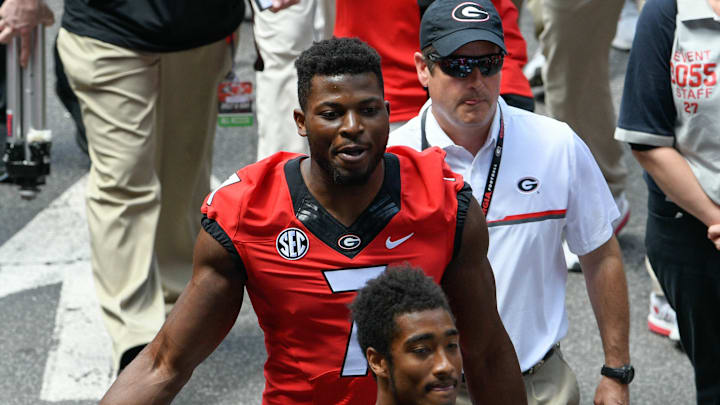 Apr 22, 2017; Athens, GA, USA; Georgia Bulldogs linebacker Lorenzo Carter (7) enters the stadium through the fans for the Georgia Spring Game at Sanford Stadium. Mandatory Credit: Dale Zanine-USA TODAY Sports