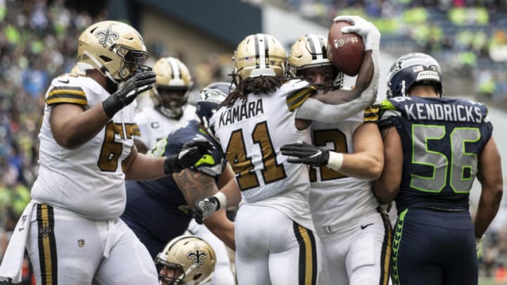 SEATTLE, WA - SEPTEMBER 22: Running back Alvin Kamara #41 of the New Orleans Saints celebrates with running back Zach Line #42 and offensive lineman Larry Warford #67 after scoring a touchdown during the second half of game against the Seattle Seahawks at CenturyLInk Field on September 22, 2019 in Seattle, Washington. The Saints won 33-27. (Photo by Stephen Brashear/Getty Images)