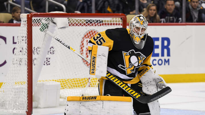 PITTSBURGH, PA - NOVEMBER 27: Pittsburgh Penguins Goalie Tristan Jarry (35) tends net during the third period in the NHL game between the Pittsburgh Penguins and the Vancouver Canucks on November 27, 2019, at PPG Paints Arena in Pittsburgh, PA. (Photo by Jeanine Leech/Icon Sportswire via Getty Images)