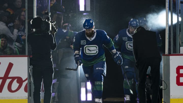 VANCOUVER, BC - FEBRUARY 08: Jordie Benn #4 of the Vancouver Canucks skaters on to the ice prior to the start of NHL action against the Calgary Flames at Rogers Arena on February 8, 2020 in Vancouver, Canada. (Photo by Rich Lam/Getty Images)